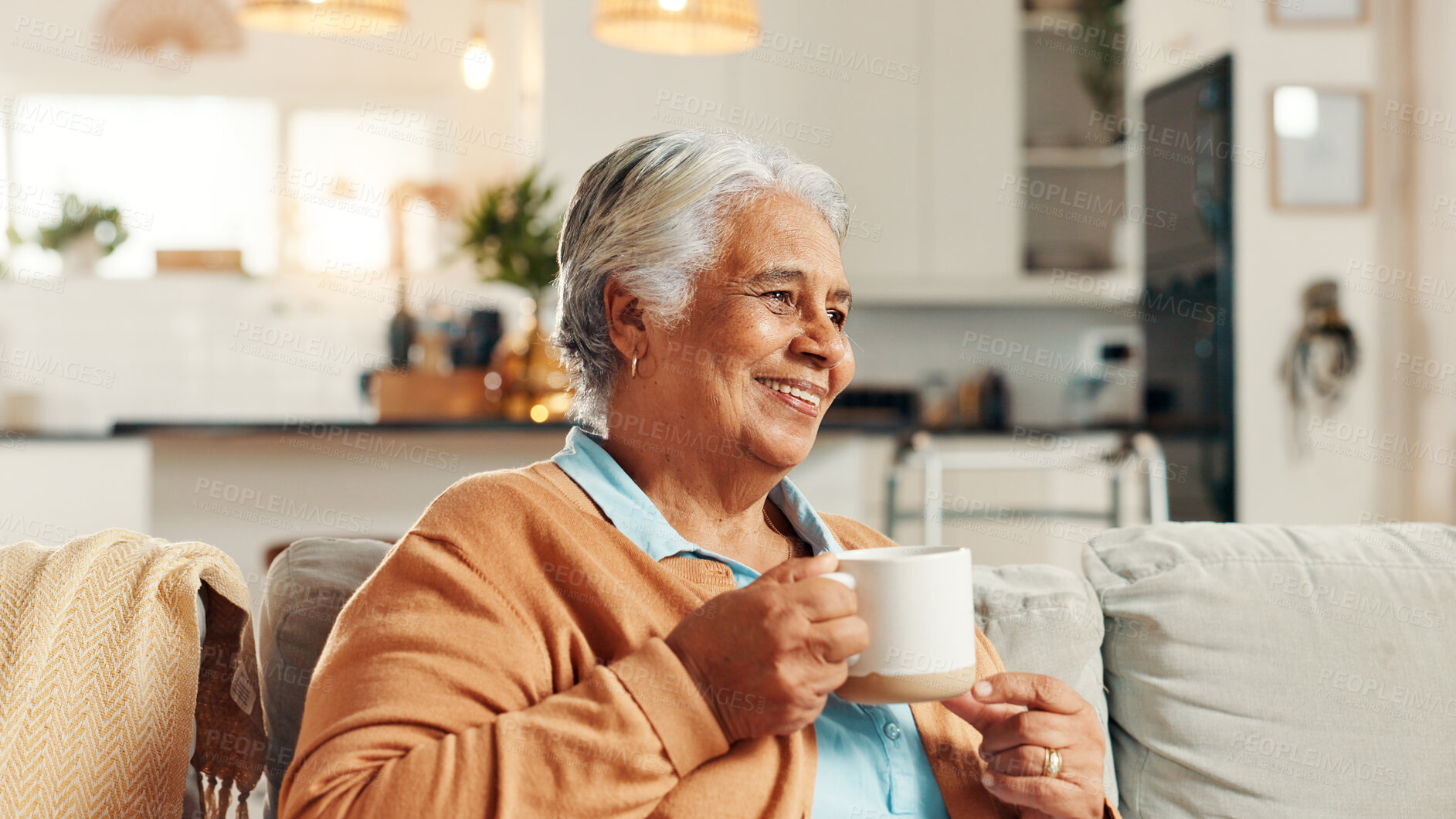 Buy stock photo Elderly woman, thinking and smile with tea for relax, nostalgia and happy memories in home. Senior person, peace and warm drink on living room sofa with reflection, wellness and comfort in retirement