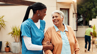 Buy stock photo Old woman, nurse and walking outdoor at retirement home with laughing, funny conversation and rehabilitation. Happy, caregiver and senior person with mobility support, bonding together and fresh air