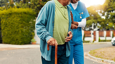 Buy stock photo Hands, nurse and senior person with walking stick, outdoor and support for steps, recovery or injury. Caregiver, help and patient with disability, balance and guide for rehabilitation in retirement