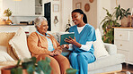 Tablet, discussion and elderly woman with nurse for medical test results on sofa in home. Digital tech, conversation and caregiver explain with senior patient, diagnosis and assisted living at house