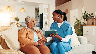 Buy stock photo Nurse, senior woman and holding hands with tablet on sofa for report with medical results, feedback or bad news. Caregiver, elderly person and stress with touchscreen, app and consultation in home