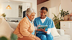 Tablet, consultation and mature woman with caregiver for medical discussion on sofa in home. Technology, conversation and nurse explain with elderly patient, diagnosis and assisted living at house