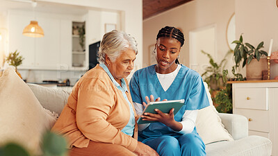 Buy stock photo Tablet, consultation and mature woman with caregiver for medical discussion on sofa in home. Technology, conversation and nurse explain with elderly patient, diagnosis and assisted living at house