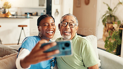 Buy stock photo Medical, selfie and smile of nurse with old man on sofa in living room of retirement home. Bonding, memories or profile picture with happy caregiver and senior patient in apartment for healthcare
