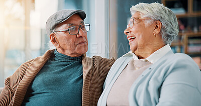 Buy stock photo Senior couple, relax and love in home with smile, bonding and healthy relationship in retirement. Elderly man, mature wife and laugh in living room with commitment, trust and support in marriage