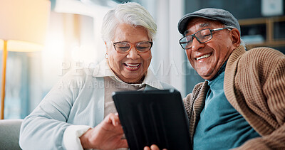 Buy stock photo Senior couple, tablet and laugh on sofa in home with meme, notification or funny video on web in lounge. Elderly man, woman and relax with touchscreen, joke or social media in retirement at apartment
