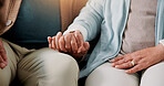 Senior couple, holding hands and relax in home with love, compassion and support in marriage. Elderly people, bonding and gesture in retirement for trust, loyalty and commitment in relationship