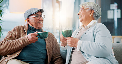 Buy stock photo Happy old couple, talking and drinking coffee in home for relax, story and enjoy latte together. Senior man, woman and tea cup in living room for retirement, laughing and morning chat with funny joke
