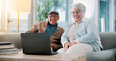 Buy stock photo Senior couple, laptop and happy on sofa in home with movie, streaming and laugh at funny video in lounge. Elderly man, woman and relax with computer, film or subscription in retirement at apartment