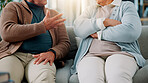 Hands, couple and argument on sofa at house for fighting, divorce conflict and partner disagreement. Elderly people, communication problem and anger for separation, marriage crisis and betrayal drama