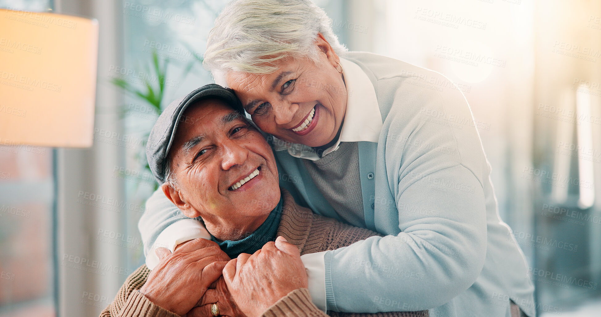 Buy stock photo Senior couple, portrait or hug in home with smile, bonding or healthy relationship in retirement. Elderly man, mature wife or love in living room with commitment, laughing or support in marriage