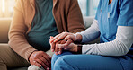 Home, caregiver and senior patient with holding hands for support, empathy and console after medical news. Sofa, nurse and old person with consultation for wellness, compassion and trust in closeup