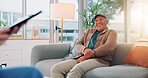 Tablet, therapy and smile with nurse and old man on sofa for counseling, psychologist and talking together. Support, healthcare and psychiatrist with senior person in office for advice and consulting