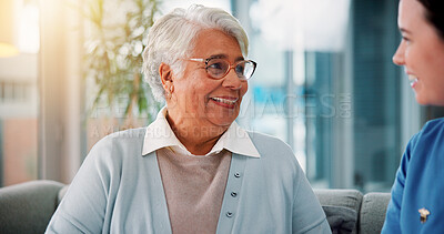 Buy stock photo Senior, woman and nurse on sofa in retirement home for healthcare support, medical service and conversation. Elderly person, caregiver and happy for homecare assistance, kindness and friendly chat