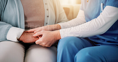 Buy stock photo Couch, caregiver and senior patient with holding hands for support, empathy and console for medical news. Home, nurse and old person with consultation for wellness, compassion and flare in closeup