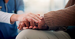 Trust, nurse and senior patient with holding hands on sofa, support and console for medical news. Home, caregiver and old person with consultation for wellness, compassion and empathy in closeup