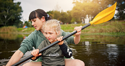 Buy stock photo Lake, child and woman with teaching for kayak, water activity and adventure in summer camp. River, female instructor and girl with learning for canoeing, skills development and paddle outdoor in boat