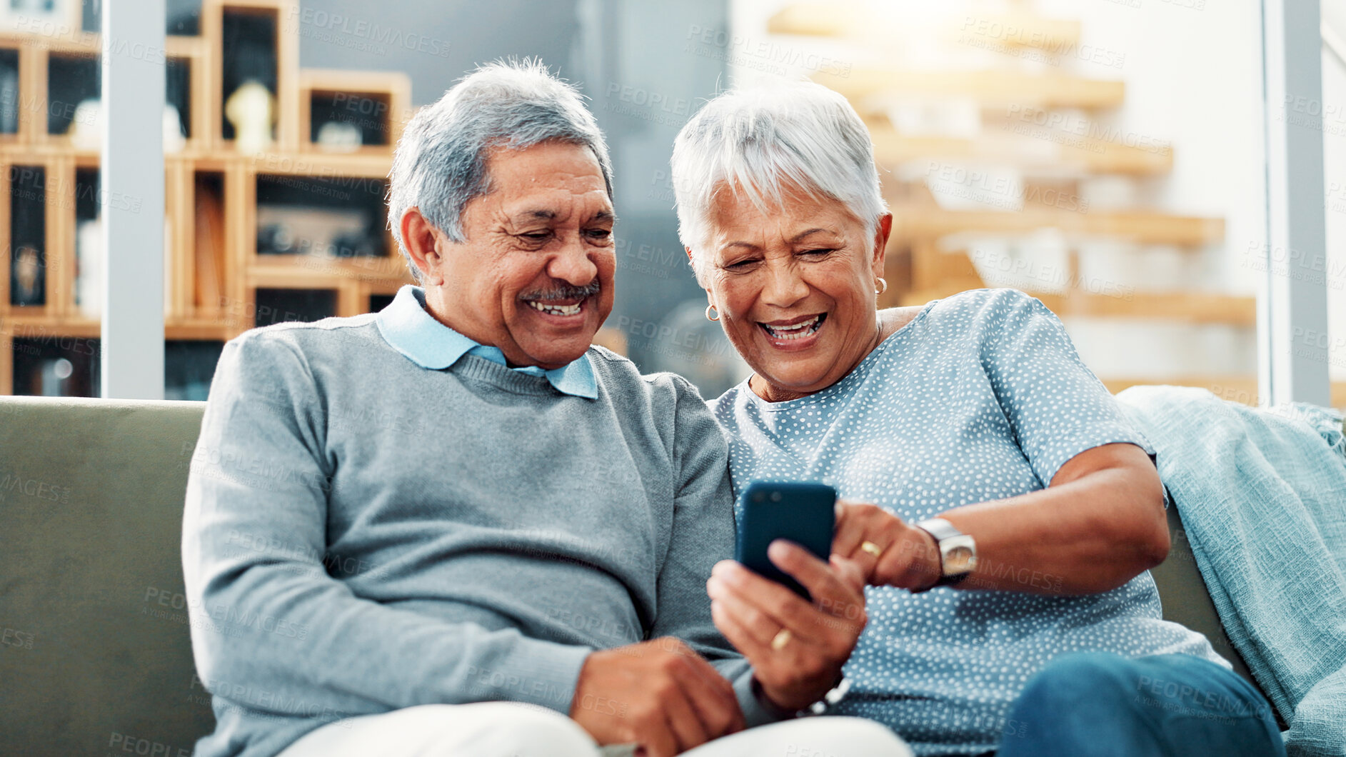 Buy stock photo Home, browsing and senior couple with smartphone, watching and streaming of movies, online and lounge. Retirement, old man and woman with mobile app for entertainment, bonding and smile for film