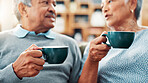 Old couple, conversation and coffee in home with relaxing together, marriage and commitment with communication. Senior, man and woman with talking for love, care and retirement with drink in house