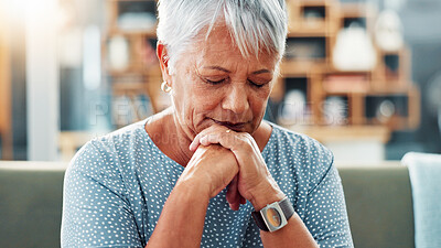Buy stock photo Old woman, praying or belief on couch in house for worship, faith or pensioner in retirement. Hope, regret or emotional with religion, spiritual or trust in God for Christianity in nursing home