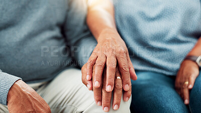 Buy stock photo Comfort, empathy and hands of couple in living room of home together for bonding, love or support. Compassion, sympathy and trust with senior people closeup in apartment for connection or healing