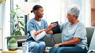 Buy stock photo Senior woman, nurse and test for blood pressure in nursing home, medical care or health exam on arm. Living room, diagnosis and conversation for healthcare, cardiovascular support or heart monitoring