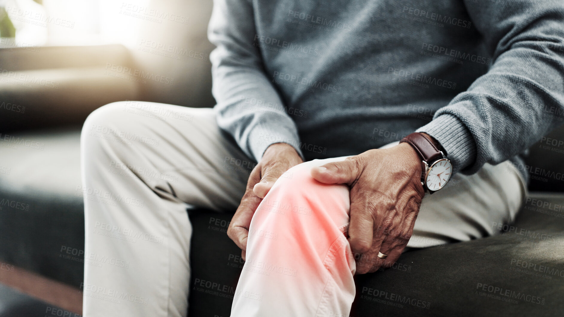 Buy stock photo Hands, knee pain and old man on couch with glow, retirement and health issue with muscle tension at home. Fibromyalgia, arthritis or brittle bones with legs, inflammation and pressure overlay closeup