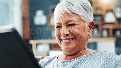 Buy stock photo Senior, happy woman and entertainment with tablet on sofa for online streaming or word search at home. Elderly, female person or user with smile on technology for fun game, movie or show at house