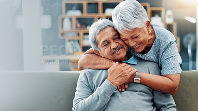 Buy stock photo Old couple, hug and happiness in home to relax together, marriage and commitment with trust or security. Senior, man and woman with embrace for affection, love and retirement with care in house space