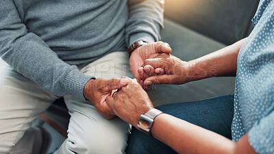 Buy stock photo Comfort, empathy and holding hands with couple in home living room together for bonding, love or support. Security, sympathy and trust with people closeup in apartment for connection or healing