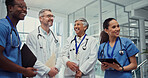 Laughing, medical or tablet with doctors and nurses in hospital together for collaboration or discussion. Documents, meeting and schedule with funny medicine team in clinic for brainstorming