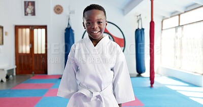 Buy stock photo Karate, portrait and smile of boy student in dojo for combat, martial arts or sports training. Exercise, fitness and workout with happy African child in gym for education, development or growth