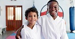 Hug, karate and portrait of friends in class for martial arts, self defense or sports training. Development, fitness and smile of student kids embracing in dojo together for exercise or workout