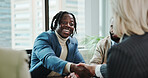 Business, man and handshake with partnership in meeting for finance deal, welcome offer and contract agreement. Financial analyst, happy and shaking hands in office for negotiation, success or hiring