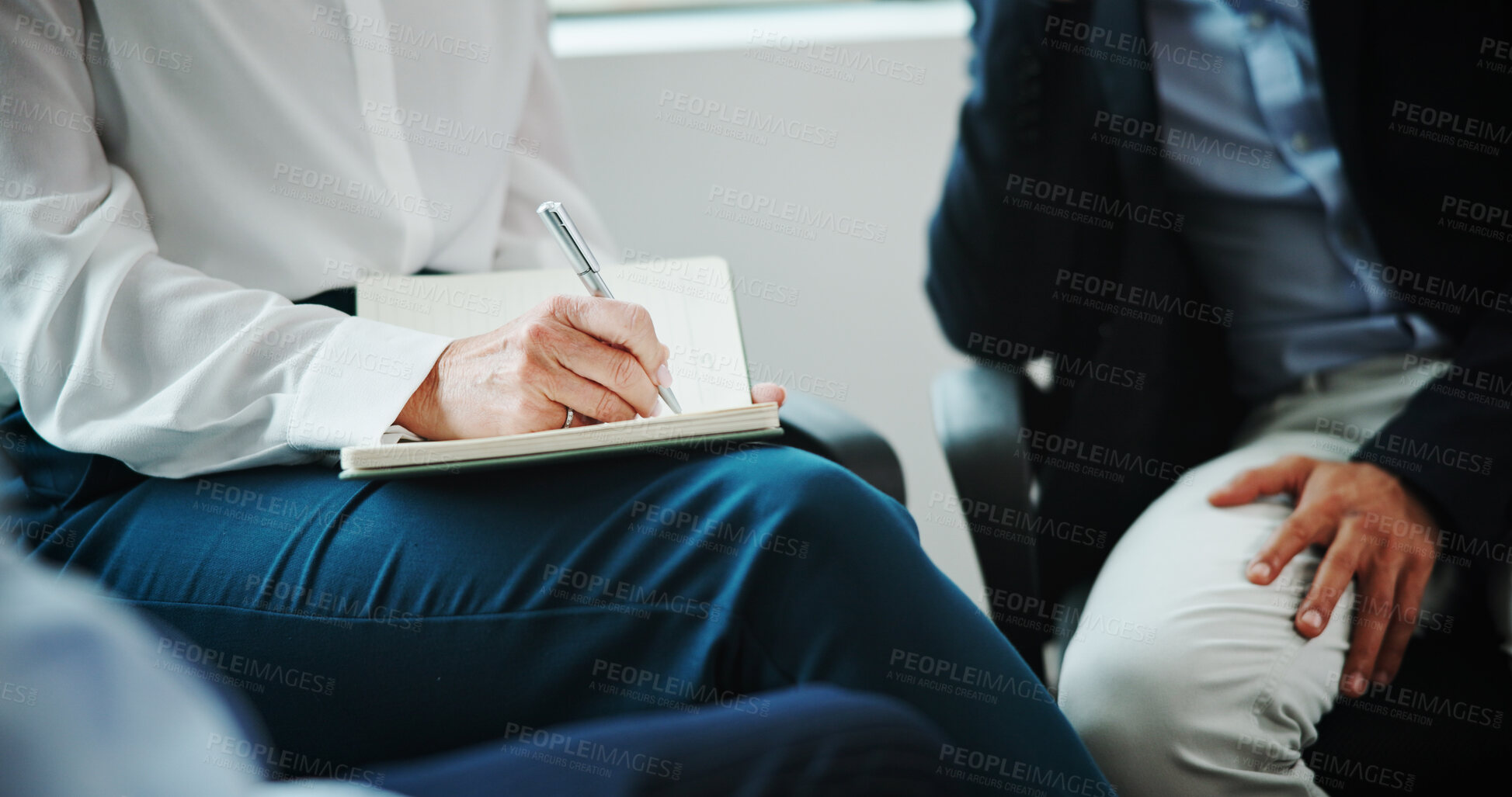Buy stock photo Business people, hands and writing with book in support group for counseling or therapy session at office. Employees, colleagues or therapist taking notes in meeting for rehabilitation at workplace