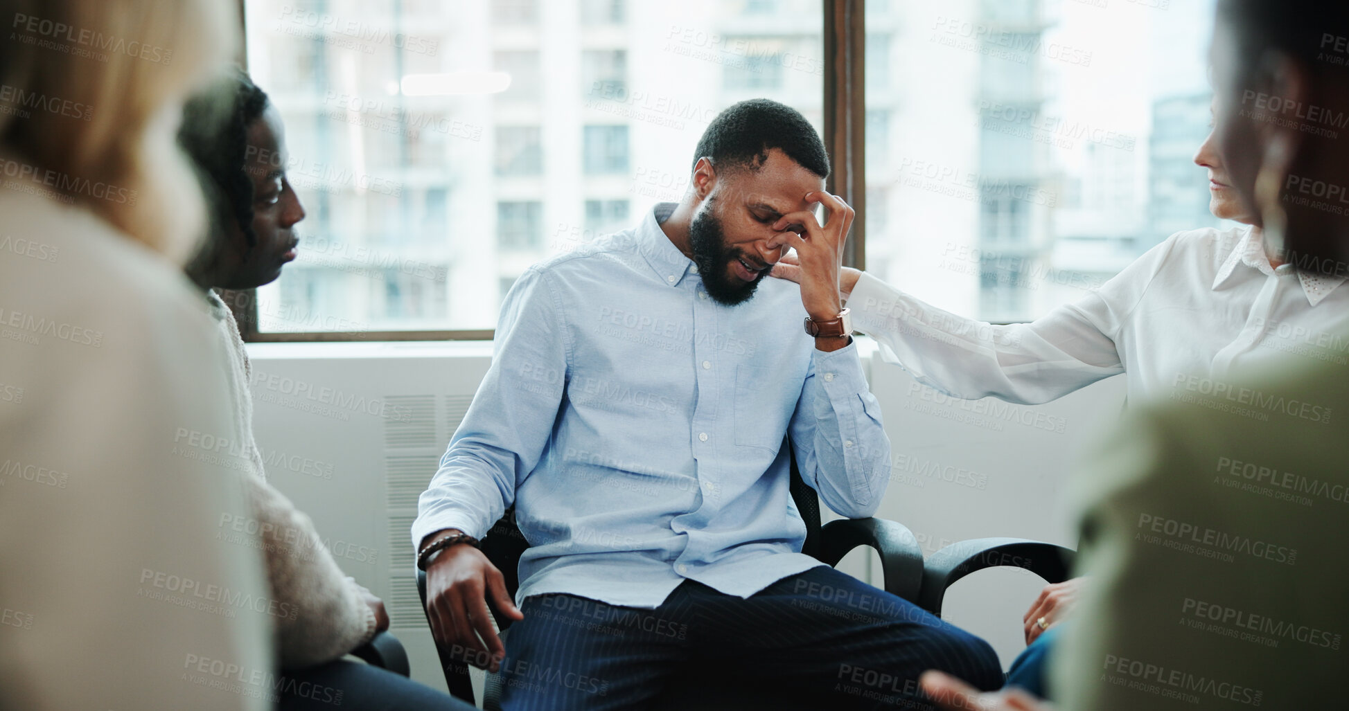 Buy stock photo Sad man, meeting and support group with team at office for rehabilitation, empathy or care. Male person, employee or emotional with community for understanding, sympathy or safe space at workplace