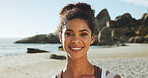 Beach, happy woman and travel in portrait for holiday, peace and freedom with confidence. Ocean, female person and outdoor with smile for adventure, summer vacation and tourist for exploration in sea