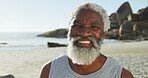Beach, senior black man and travel in portrait for holiday, peace and happiness with confidence. Ocean, male person and outdoor with smile for adventure, vacation and tourist for exploration in sea