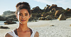 Beach, happy woman and travel in portrait for vacation, peace and freedom with confidence. Ocean, female person and outdoor with smile for adventure, summer holiday and tourist for exploration in sea
