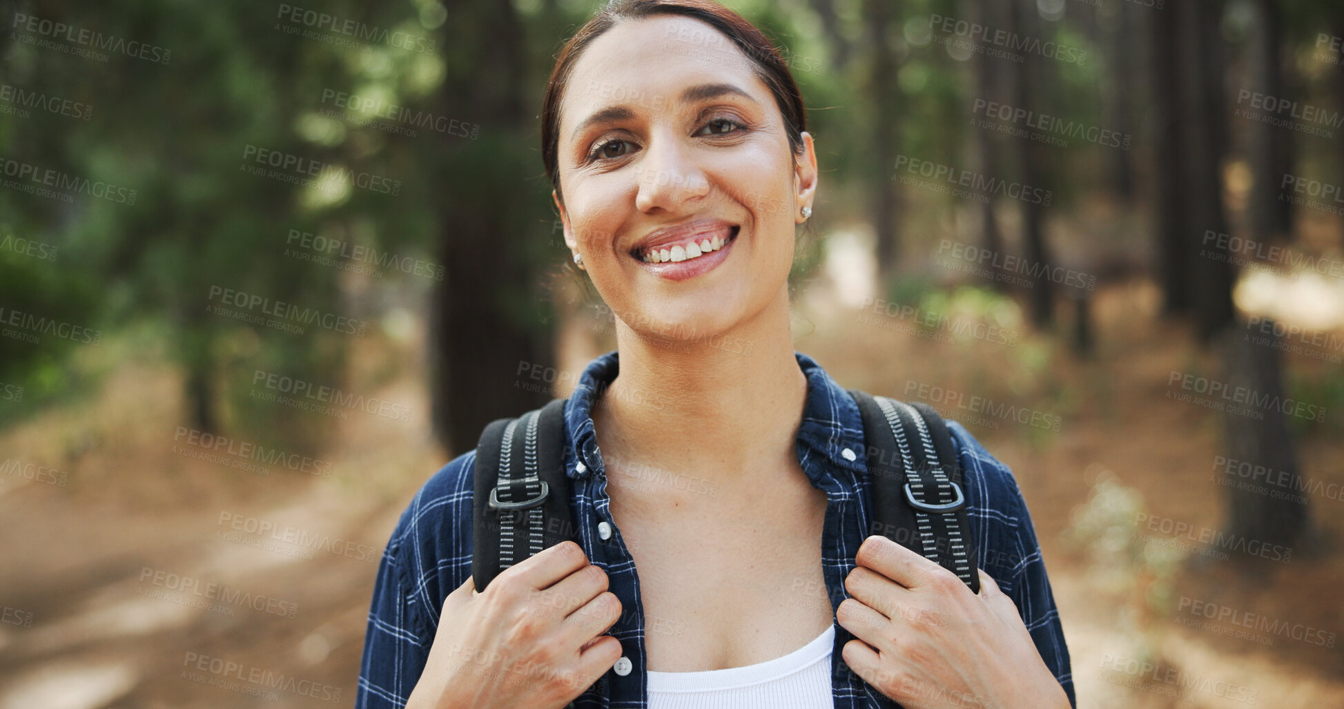 Buy stock photo Hiking, smile and portrait of woman in forest with backpack for exercise, cardio workout and walking. Happy, travel and person in nature, trail and woods for trekking, adventure and fitness outdoor