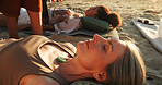 Woman, crystal and ground at beach with chakra balance, therapy and outdoor for healing on vacation. People, stone and holistic with mineral, mindfulness and care with energy for zen in summer