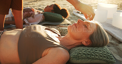 Buy stock photo Woman, crystal and hands at beach with chakra balance, care and therapy with rest on vacation. People, awareness and shaman with stone on forehead with mineral, mindfulness or zen on ground in summer
