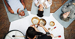 Nature, sound therapy and above of people with bowls for mindfulness, spiritual cleanse and energy. Meditation, healer and men and women with vibration for healing, balance and wellness on floor