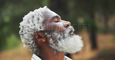 Buy stock photo Outdoor, nature and black man with breathing for hiking, holiday and adventure for relaxing on weekend. Senior person, hiker and face with peace for traveling, explore woods and fresh air for tourist