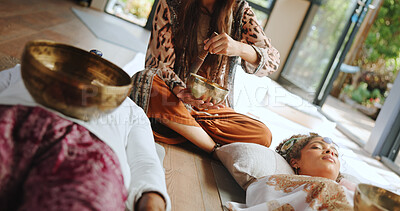 Buy stock photo Tibetan bowl, meditation and zen with couple in studio for spiritual healing, aura cleanse and sound therapy. Holistic vibration, crystal and energy with people for mindfulness and wellness ritual