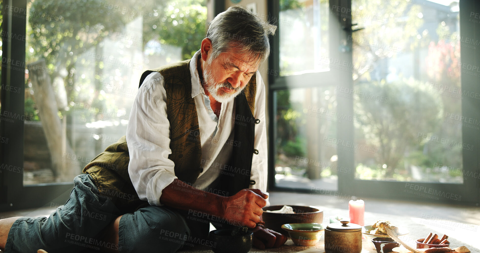 Buy stock photo Crystal, alternative medicine and Asian man on floor for spiritual meditation, holistic treatment and healing. Aromatherapy, cleanse and healer with stones for peace, chakra and detox for wellness
