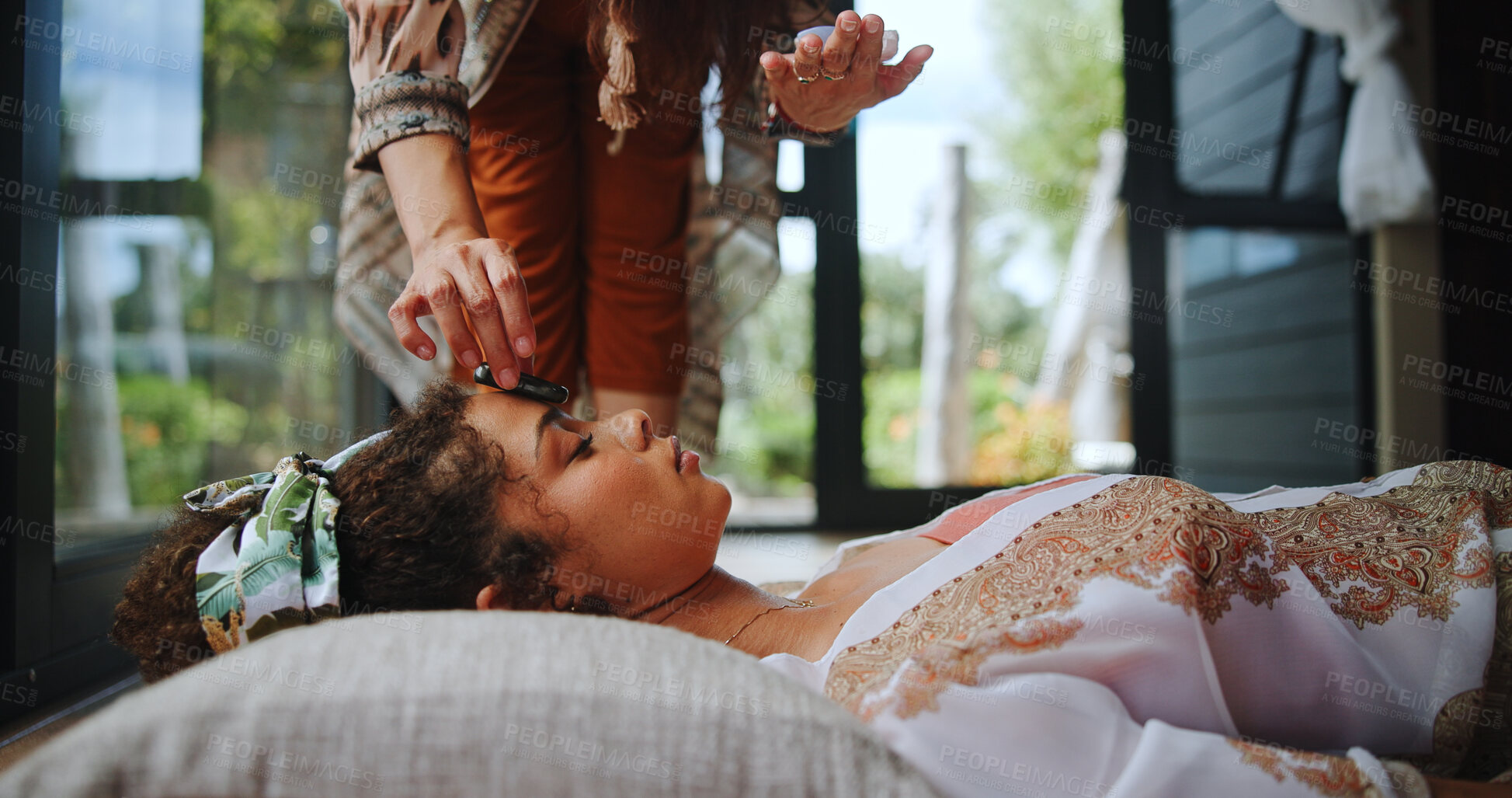 Buy stock photo Spiritual, floor and woman with shaman, hands and ritual for self awareness, meditation and calm. Inner peace, chakra and zen with ceremony for soul, holistic and awakening of person with mantra