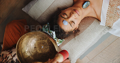 Buy stock photo Healing, calm and woman with healer, hands or mantra for inner peace, spiritual or gemstone for chakra. Meditation, shaman or sound therapy with Tibetan singing bowl, vibration or holistic for person