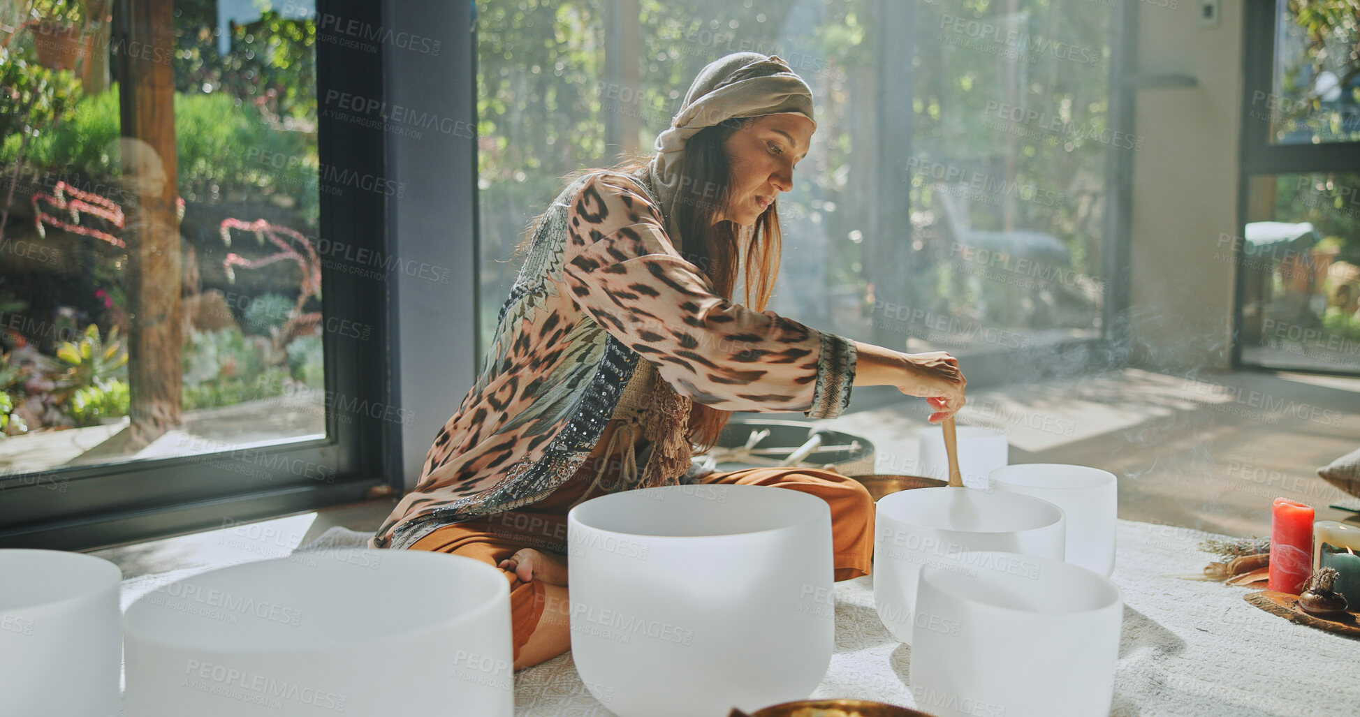 Buy stock photo Woman, alternative medicine and healing with naturopath with smoke, ceremony and culture in studio. Female healer, herbs and aromatherapy for Buddhism with herbal remedy or natural ritual for cleanse