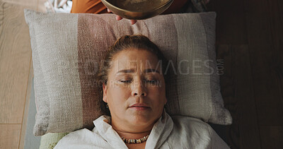 Buy stock photo Relax, singing bowl and woman at guided meditation class for mindfulness, calm and balance practice. Above, yoga nidra and female person at sound therapy session for wellness, health or release